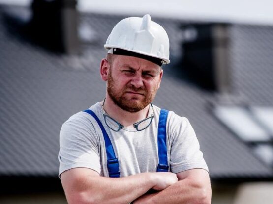 Builder with Hard Hat and Magnetic Clip Glasses around his neck