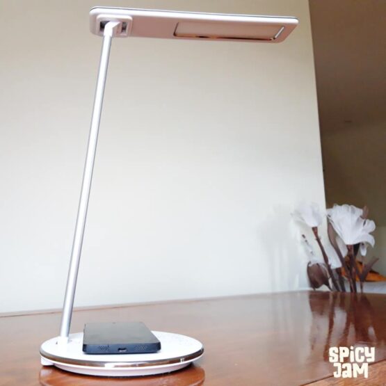 Picture of an LED Lamp charging a Mobile Phone.