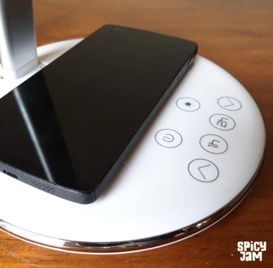 Phone Charging on LAMP on a table