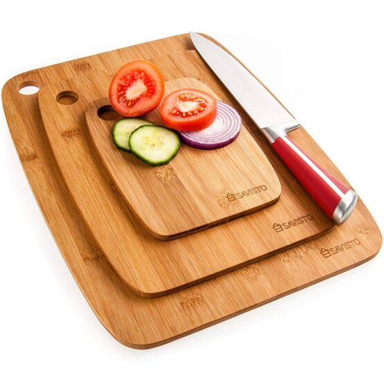 Three wooden chopping boards left on top of each other