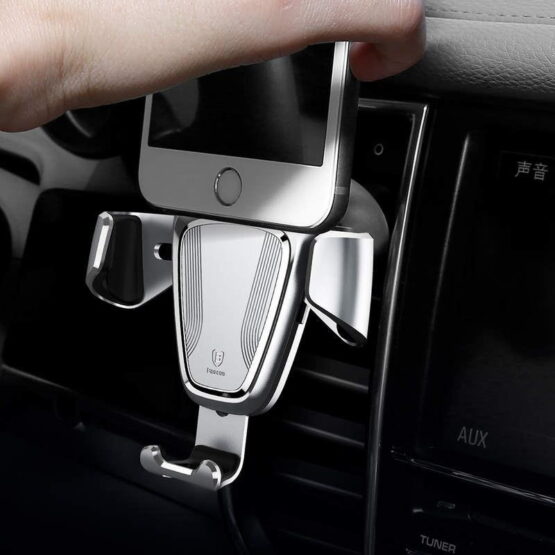 Silver phone holder connected to car vent