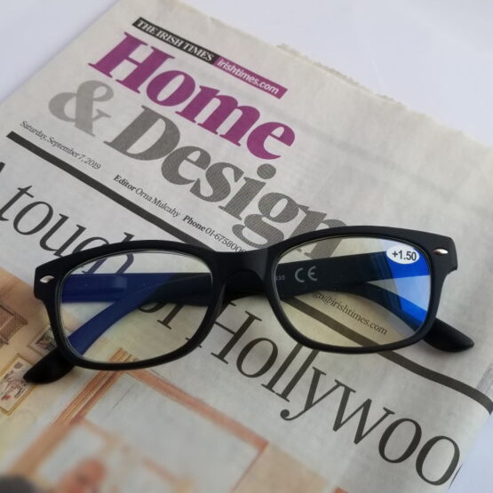 Black Framed Glasses on Irish Times Newspaper