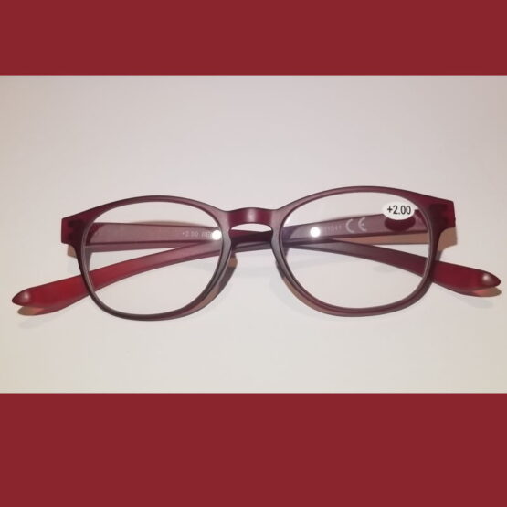 Folded Red Reading Glasses on Black Background